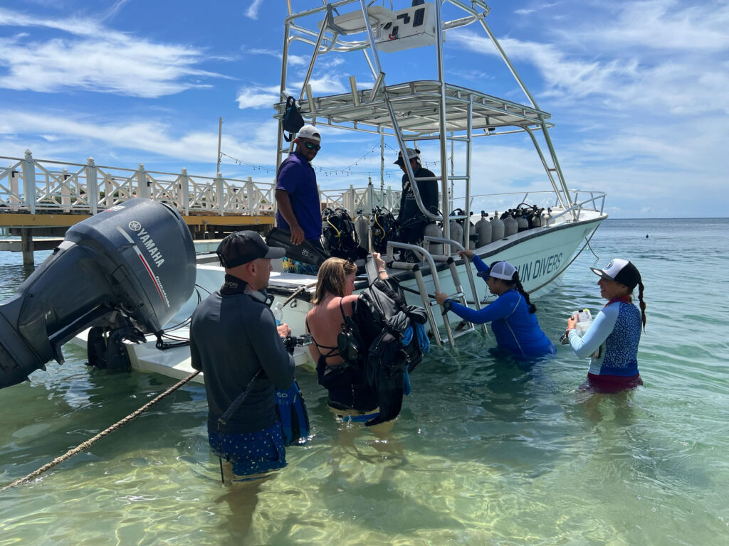 CORAL divers on boat in Honduras