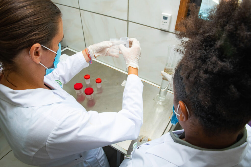 The Bay Islands Conservation Association—BICA—team members testing water quality from the coral reefs on the island of Roatan, Honduras