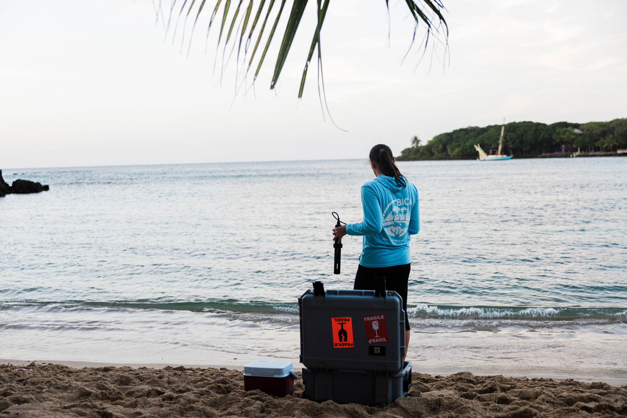 CORAL partner, BICA, monitors water quality in the waters of Half Moon Bay on the island of Roatan, Honduras