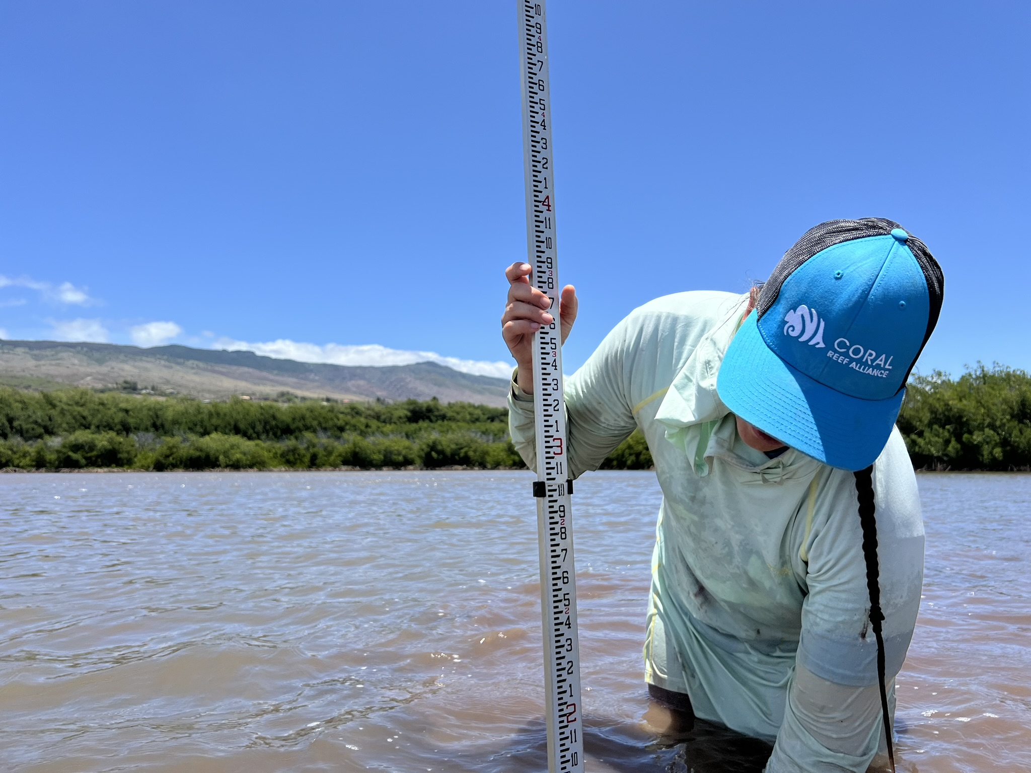 CORAL scientist, Sarah Severino, tests water turbidity in Molokai