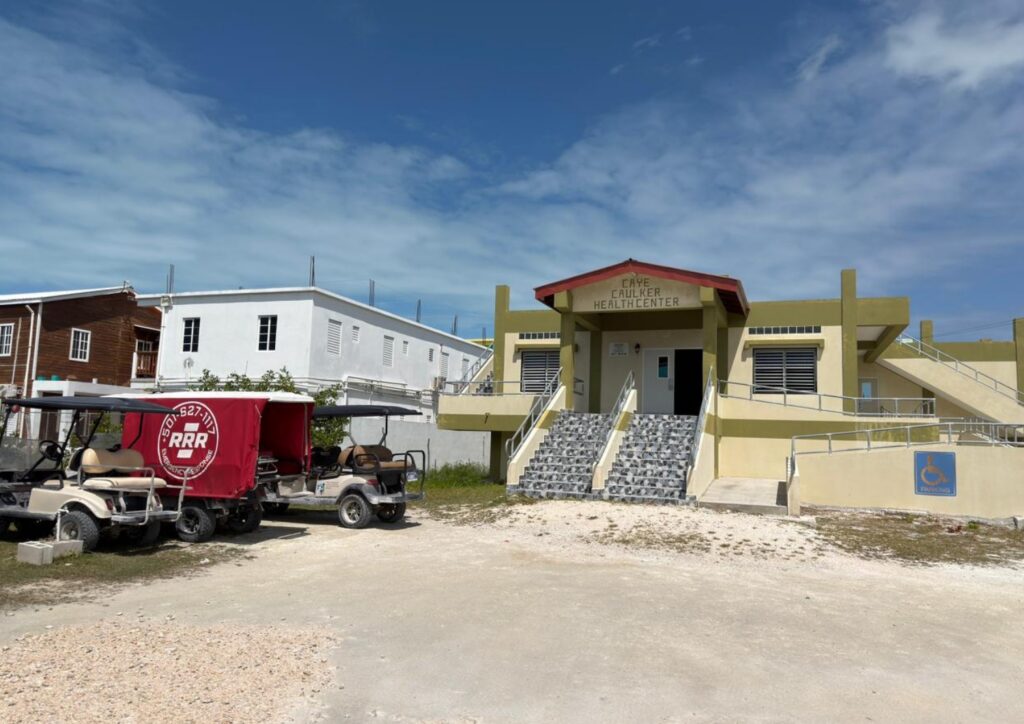 External photo of a health center building in Caye Caluker, Belize